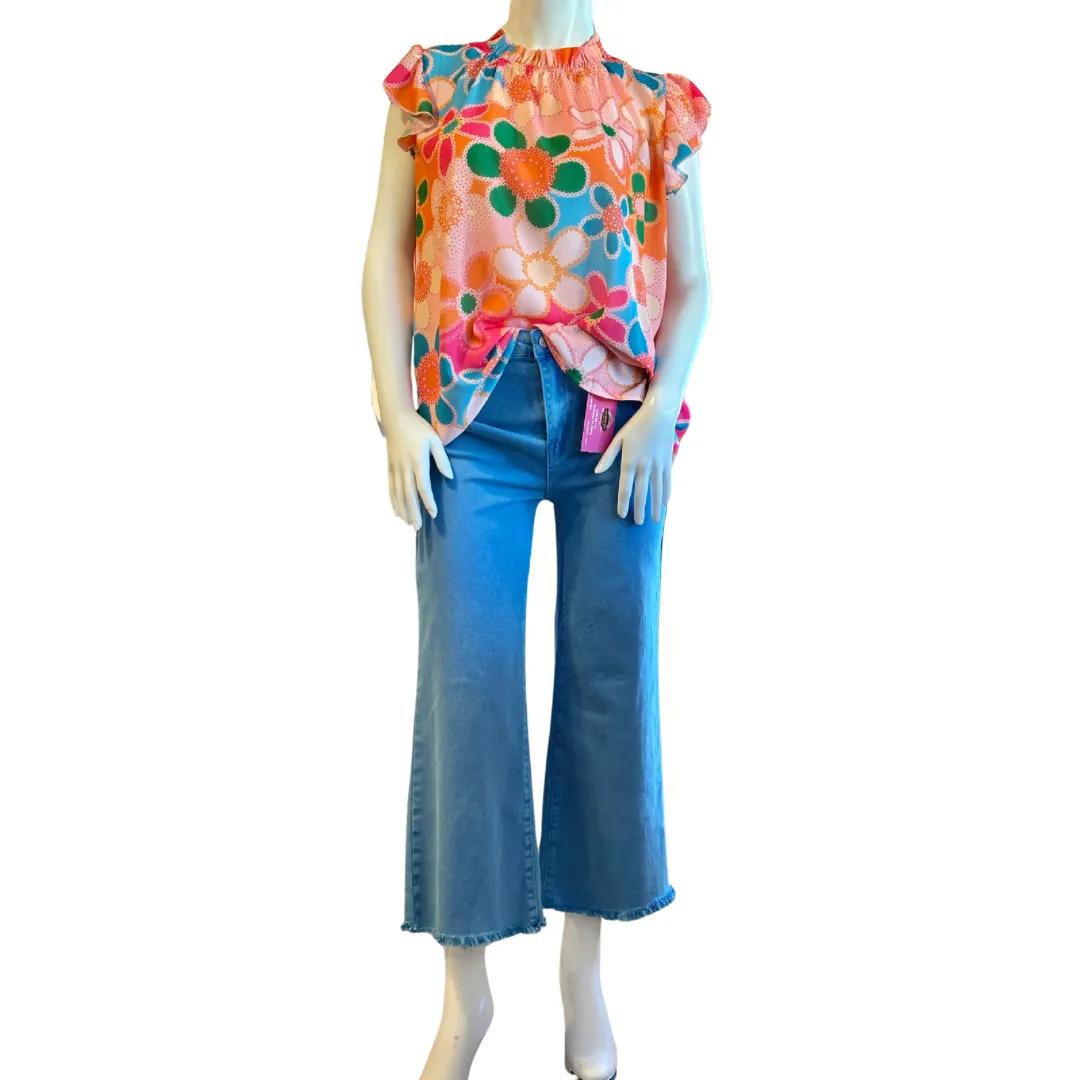 Floral print top with ruffled neckline and flutter sleeves